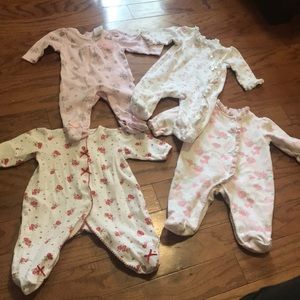 Bundle of 4 baby onesies